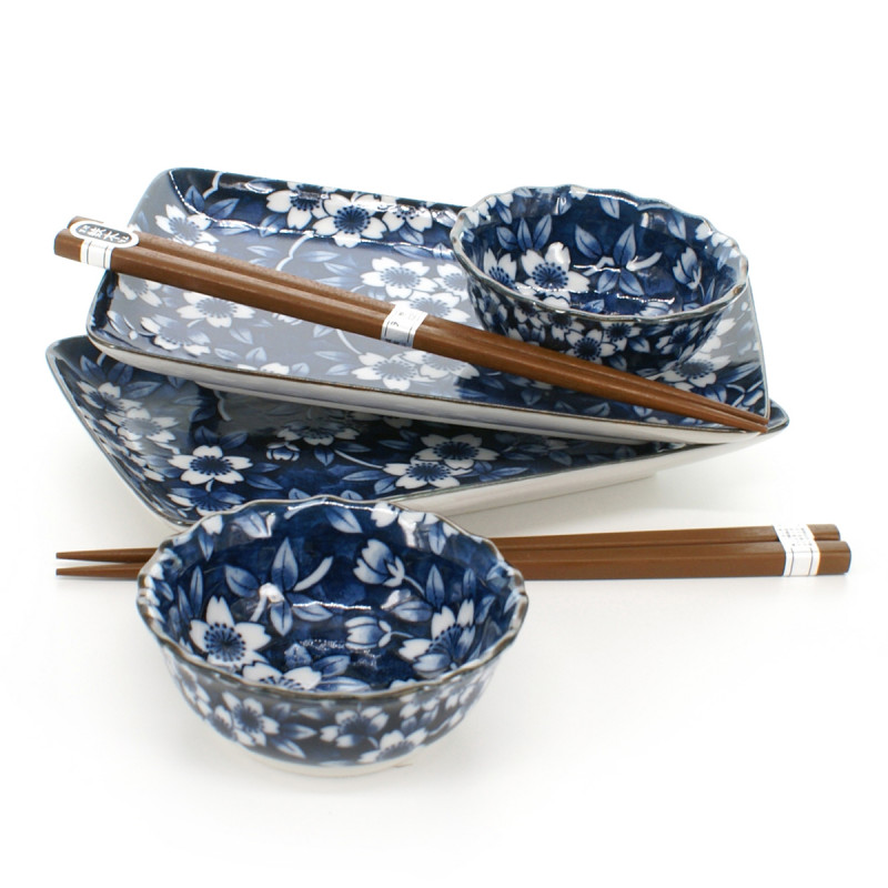 2 plates 2 bowls set with flower patterns and pairs of chopsticks white and blue SHIMITSU