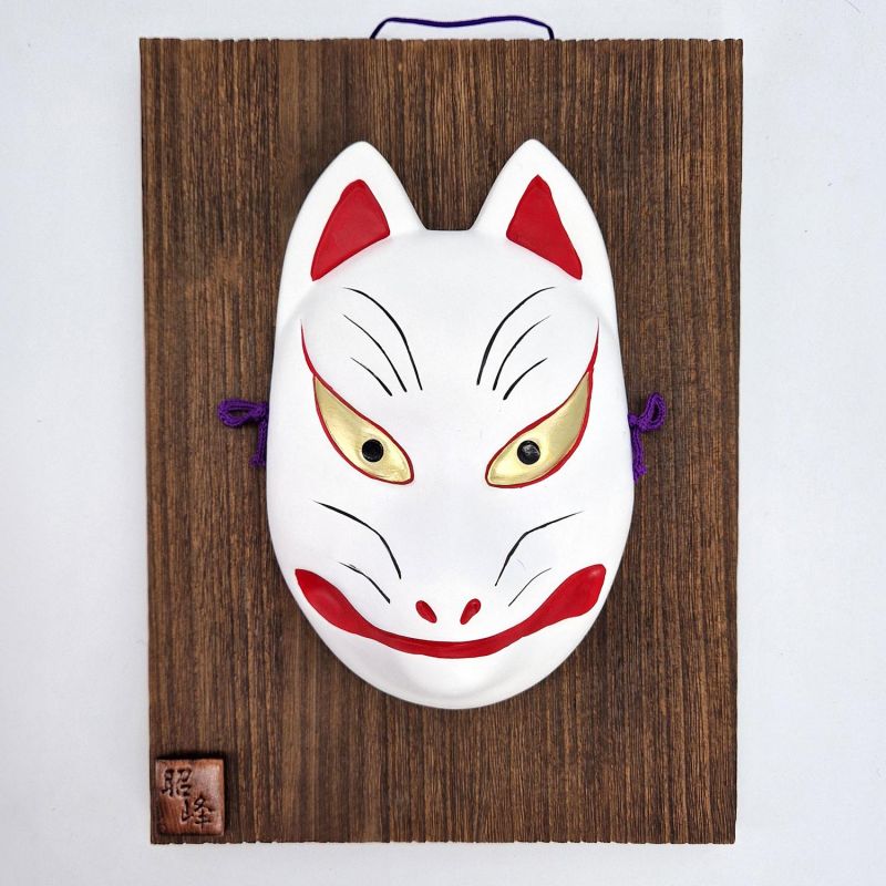 Noh mask representing a white kitsune fox in ceramic with a wooden frame